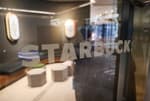 La Policía surcoreana registra las oficinas de Starbucks tras una polémica campaña que evocó una masacre